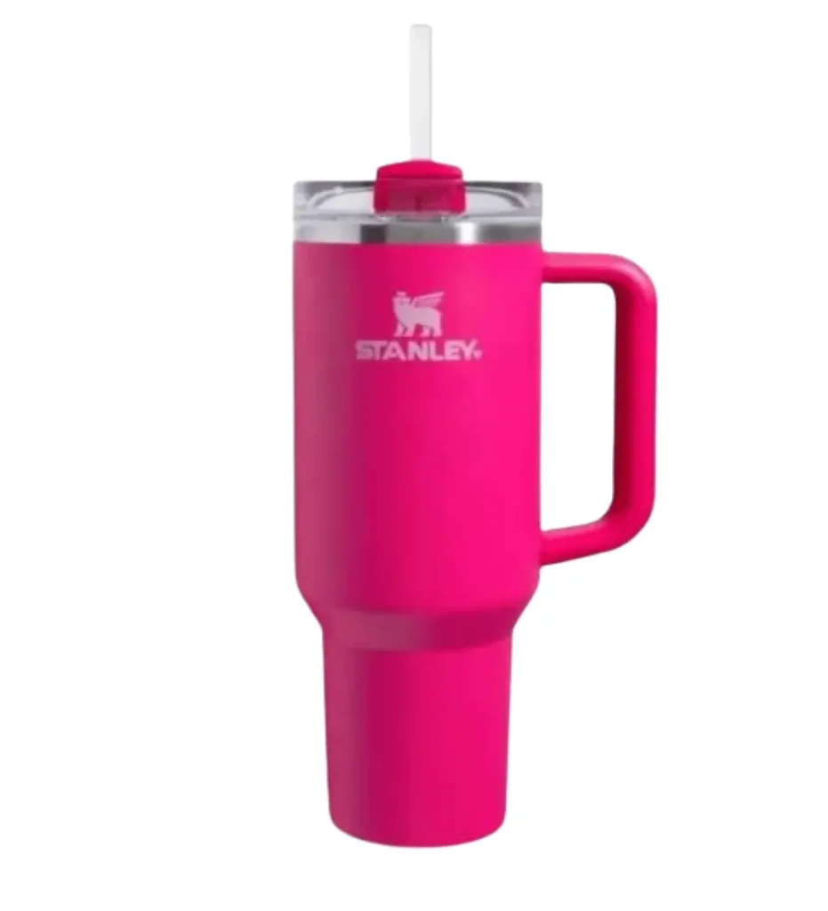Bright pink Stanley Quencher H2.0 FlowState tumbler with handle, lid, and straw, a viral limited-edition Valentine's Day hydration essential trending on social media.